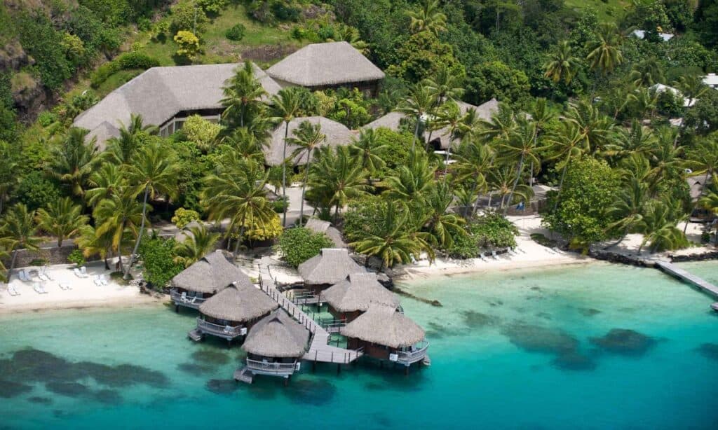 Maitai Polynesian best resort bora bora bungalows on beach overlooking lagoon