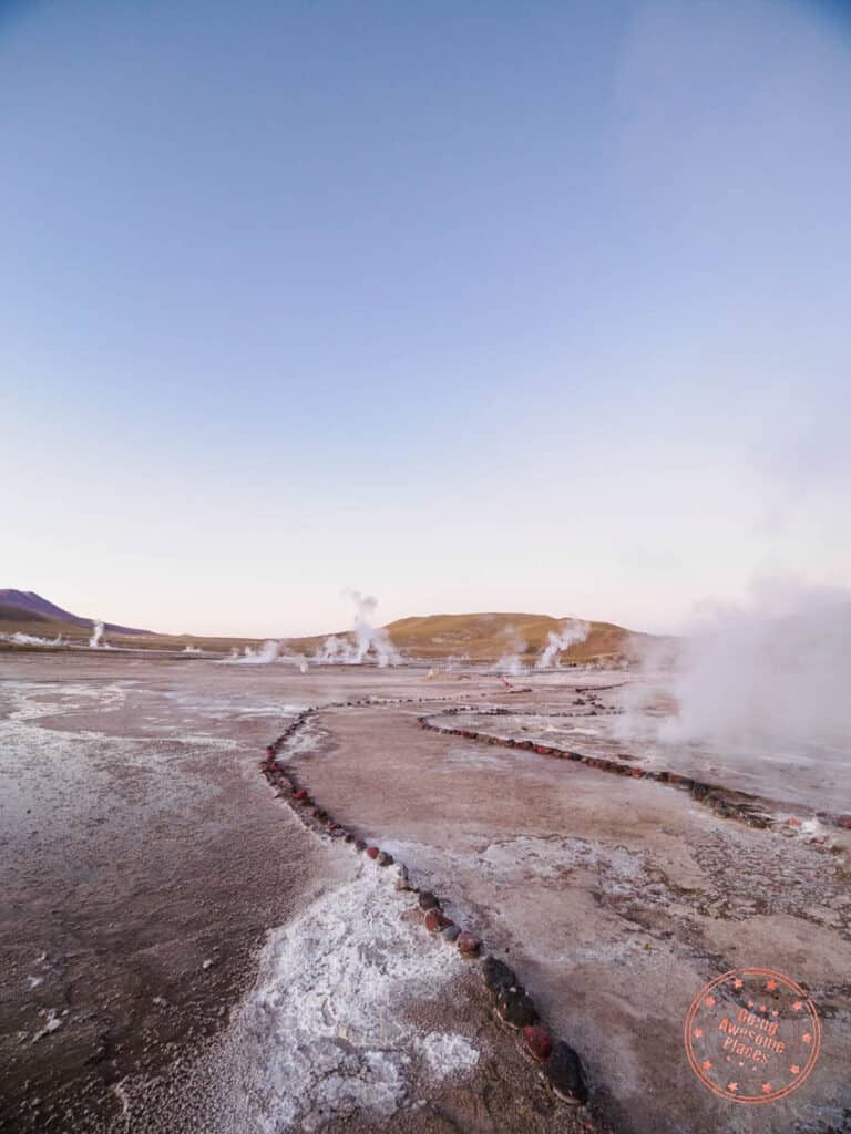 geyser field at geyser del tatio in the early morning