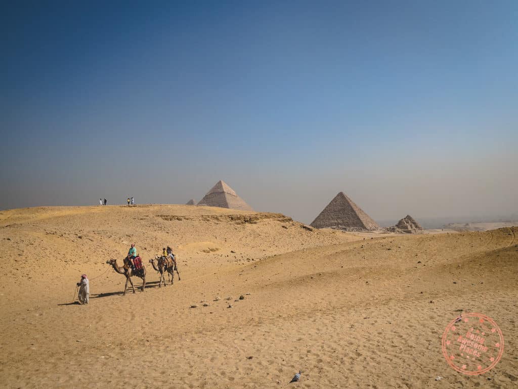 great pyramids of giza with camels in the foreground as part of 10 day itinerary for egypt
