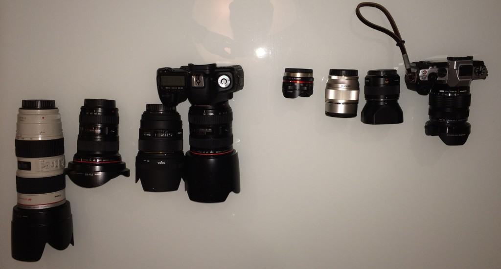 Top Down view of all of my camera gear. DSLR stuff ont he left. M43 stuff on the right.