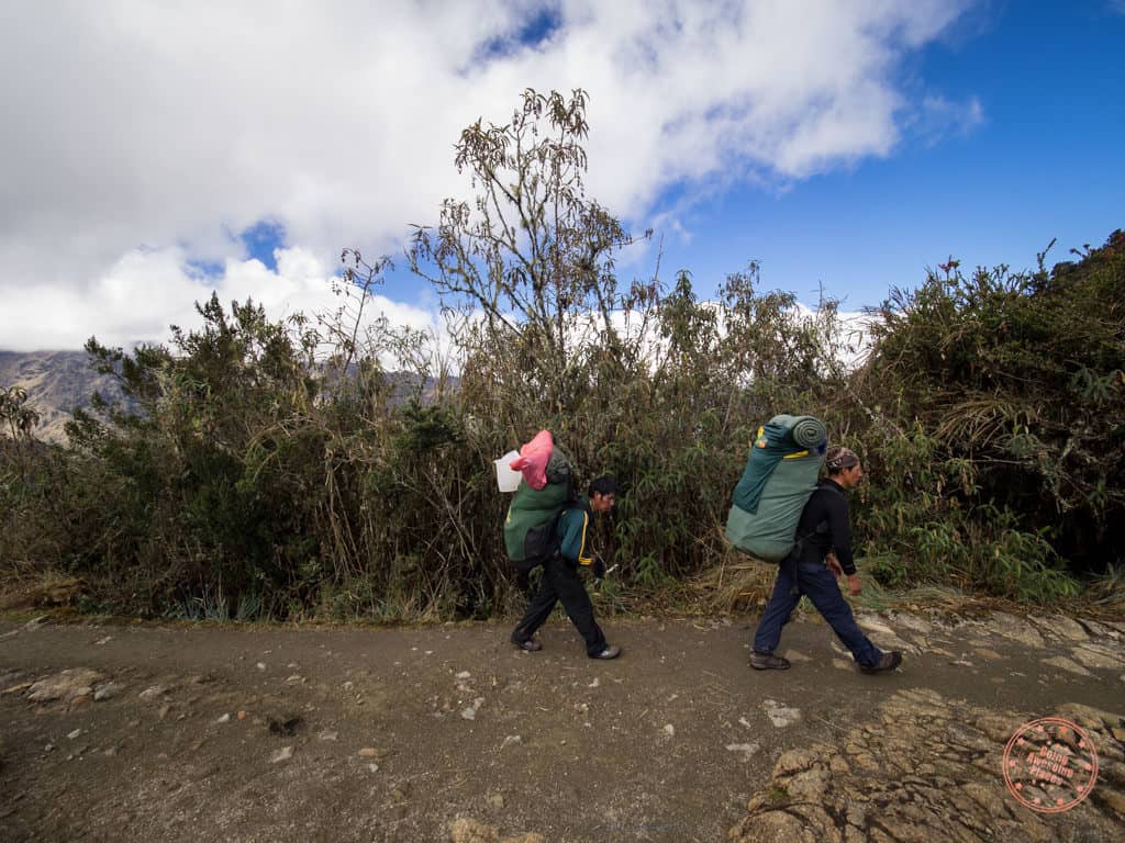 porters along the trail are the real superheroes