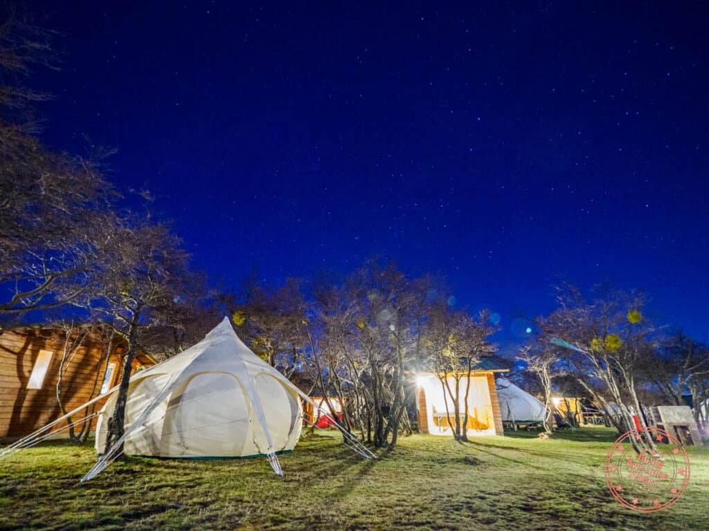 riverside camp review with tents at night